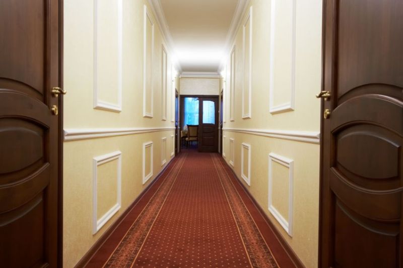 793580 - long corridor with a window in modern hotel